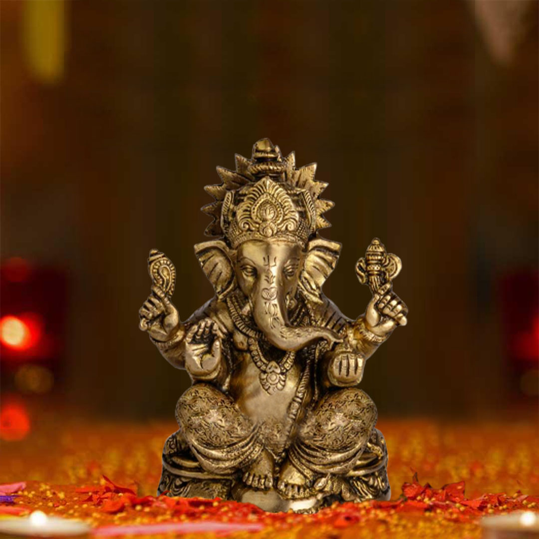 Brass Ganesha – Seated On Curved Base