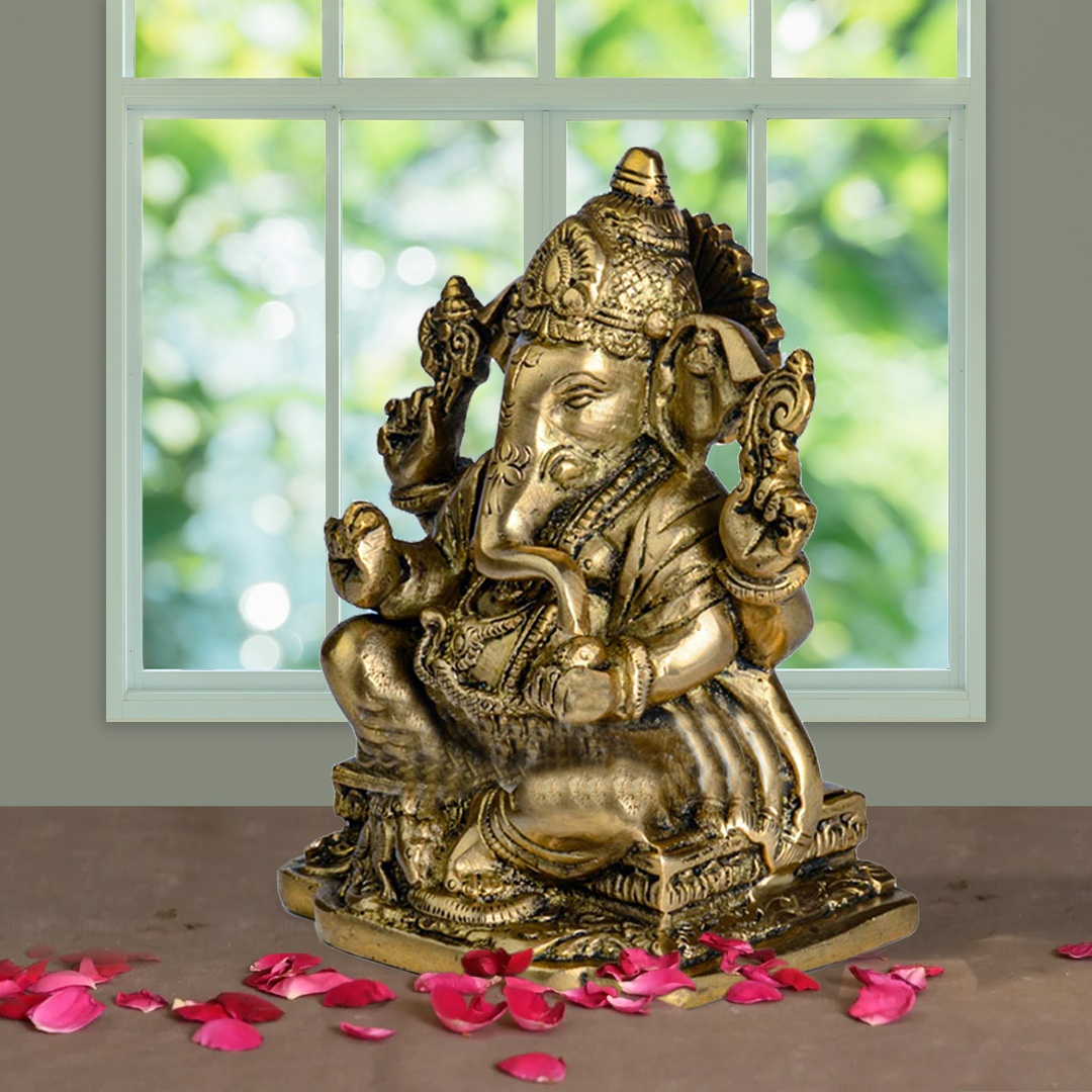 Brass Ganesha – Seated On Carved Base