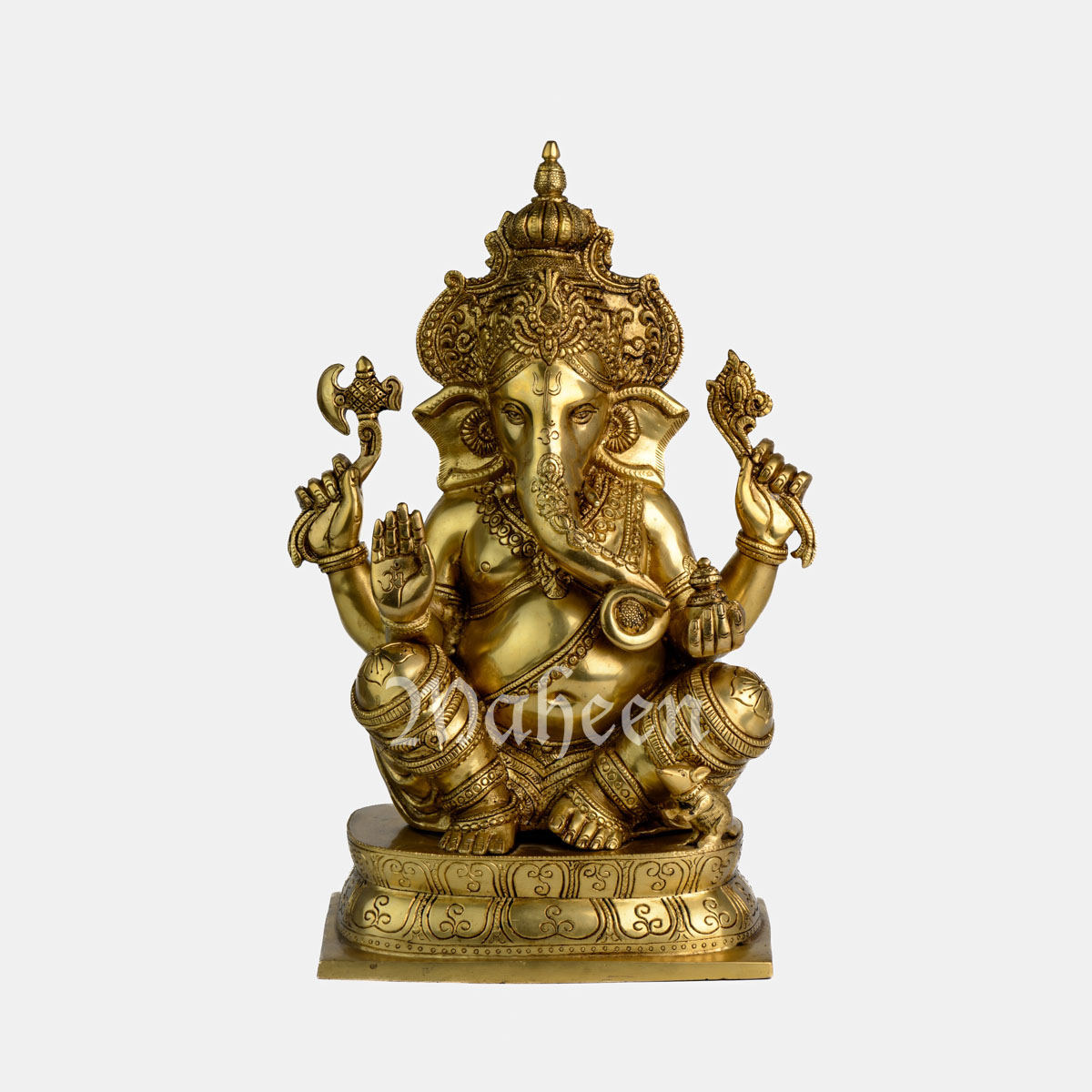 Brass Ganesha – With Ornate Dress & Crown Work, Seated On Oval Base