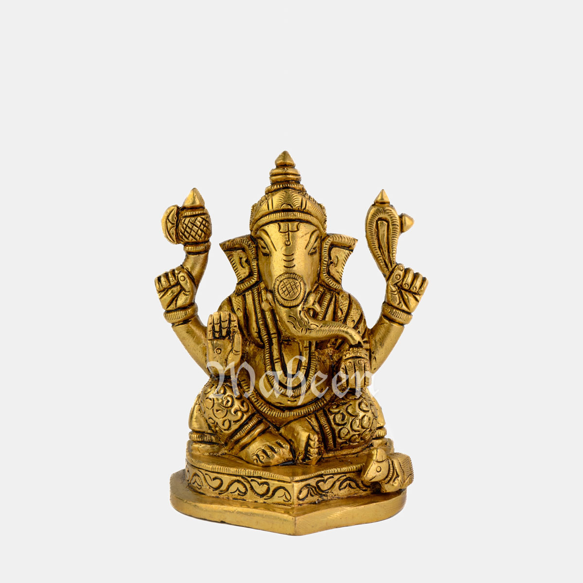 Brass Ganesha – Seated On Leaf Shaped Base