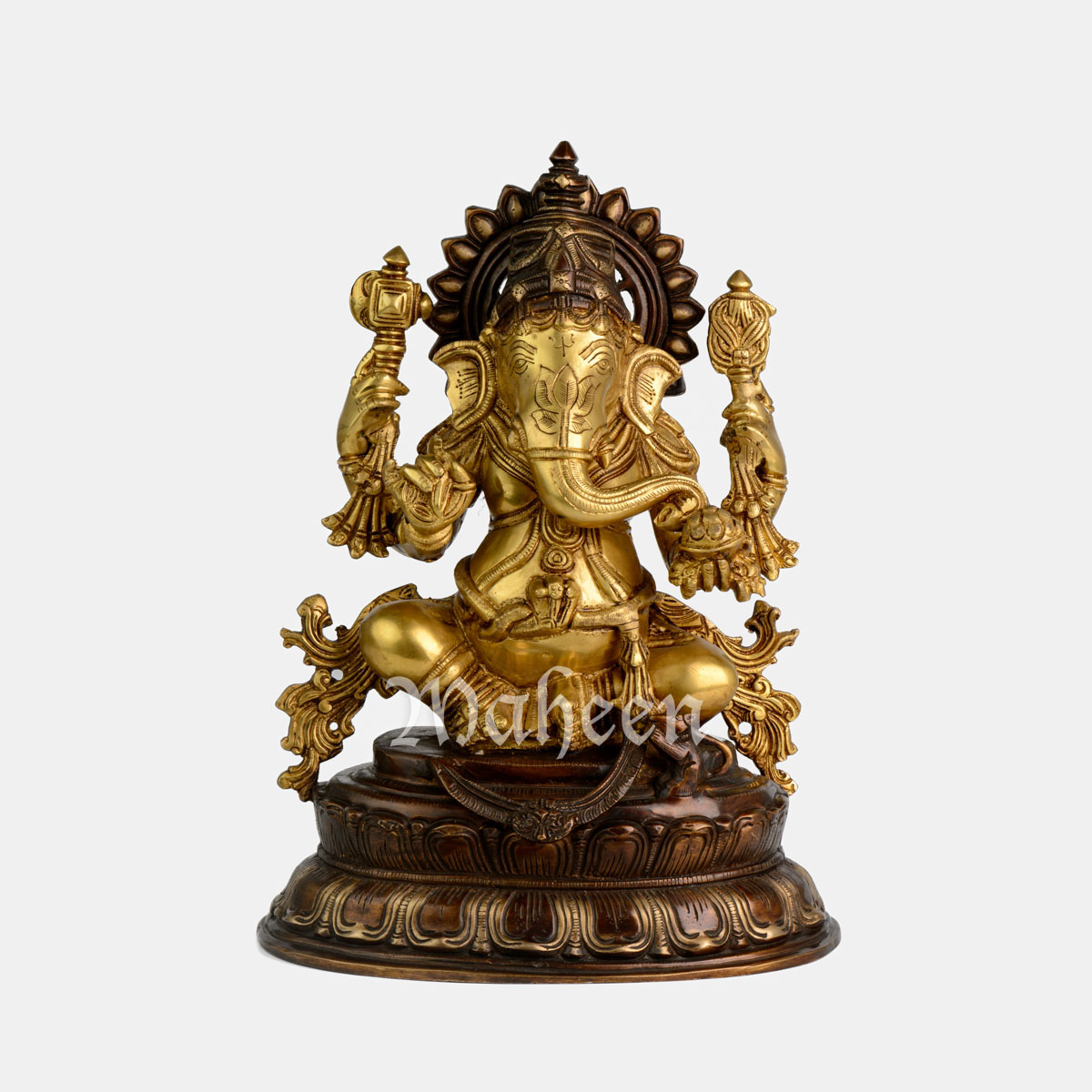Brass Ganesha – With Ornate Carvings, Seated On Oval Lotus Base