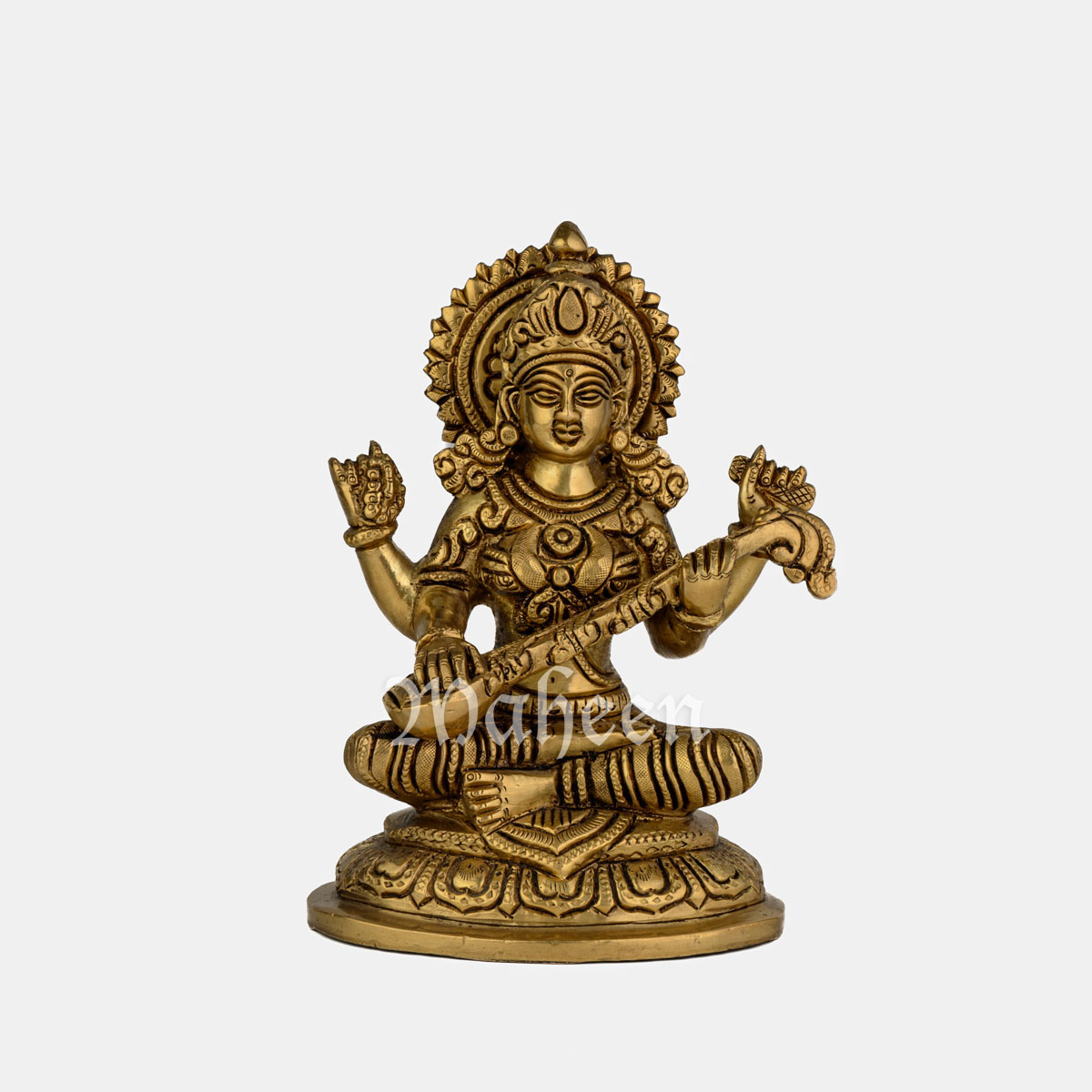 Brass Saraswati – Seated On Lotus Carved Base